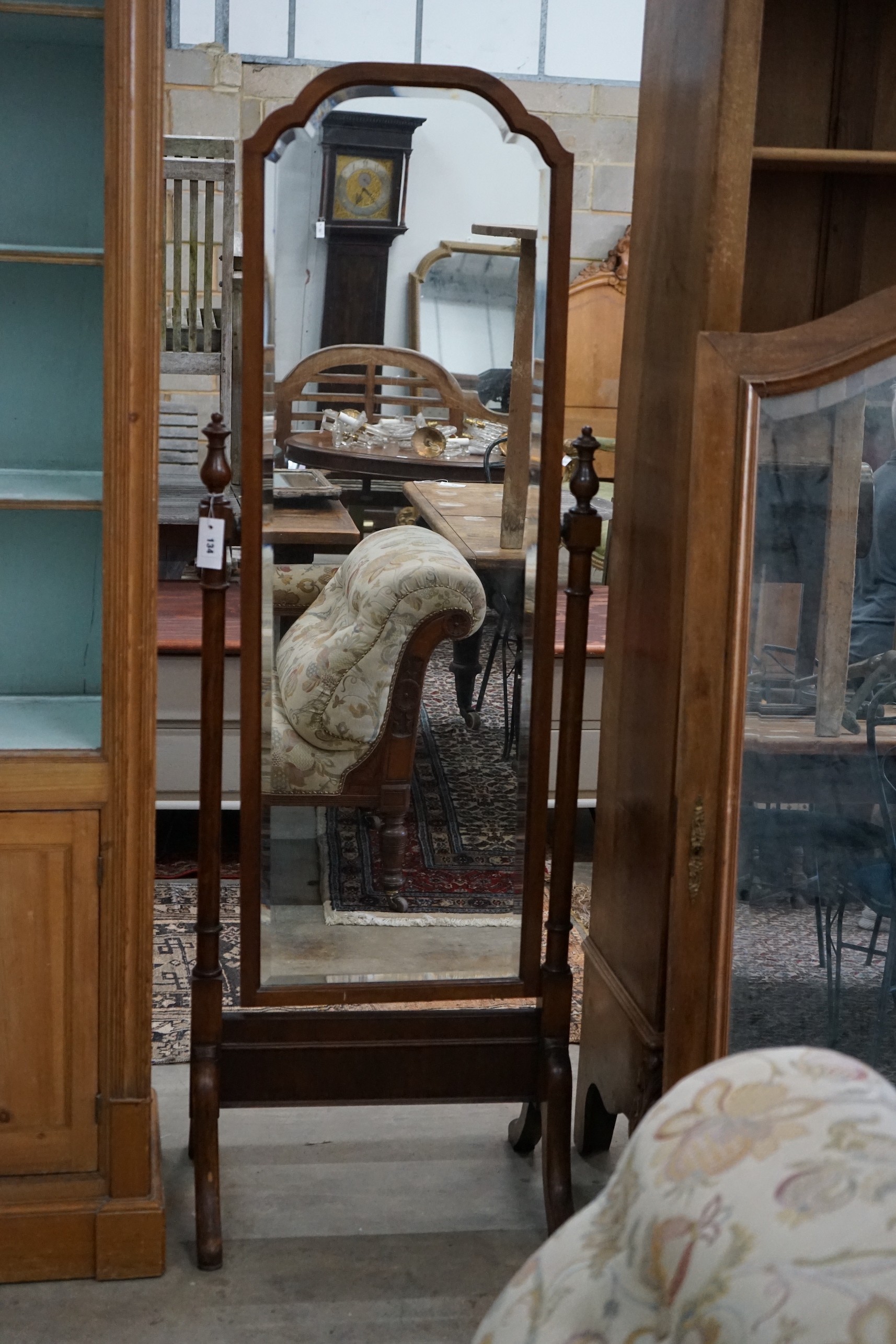 A 1920's mahogany cheval mirror, width 58cm, height 169cm